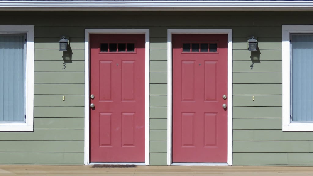 2 red exterior doors with white frames